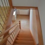 Buchentreppe mit Edelstahl Stäben